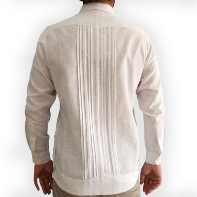 Close-up of French cuffs on white formal wedding guayabera