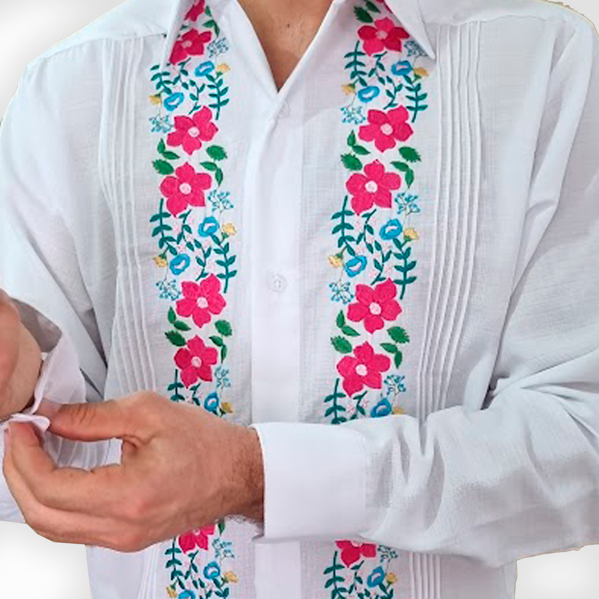 Close-up of colorful floral embroidery on guayabera fabric