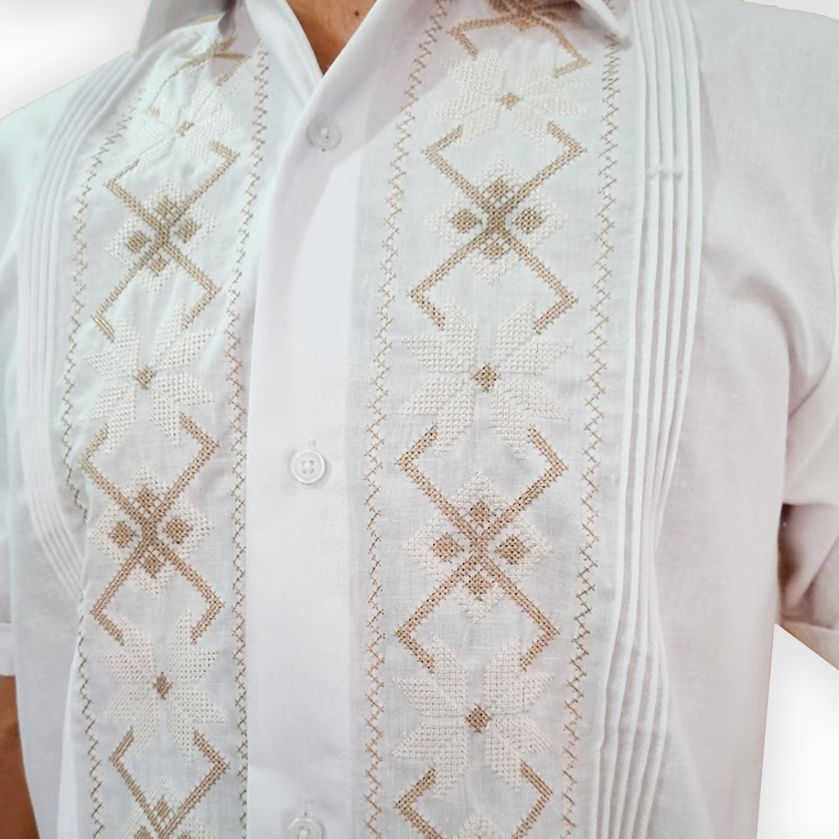 Close-up of embroidery and pleats on traditional white guayabera – Casa Habana craftsmanship