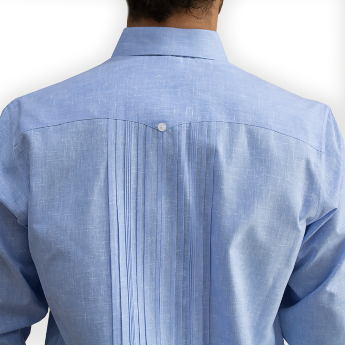 Close-up of light blue cotton fabric – Casa Habana guayabera