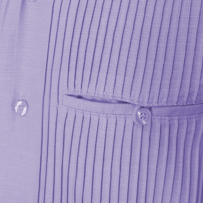 Close-up of lilac guayabera pockets and button details