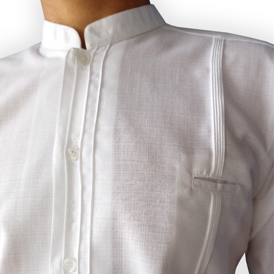 Close-up of mandarin collar on traditional white guayabera