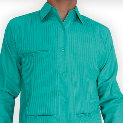 Close-up of mint green guayabera fabric and pleats