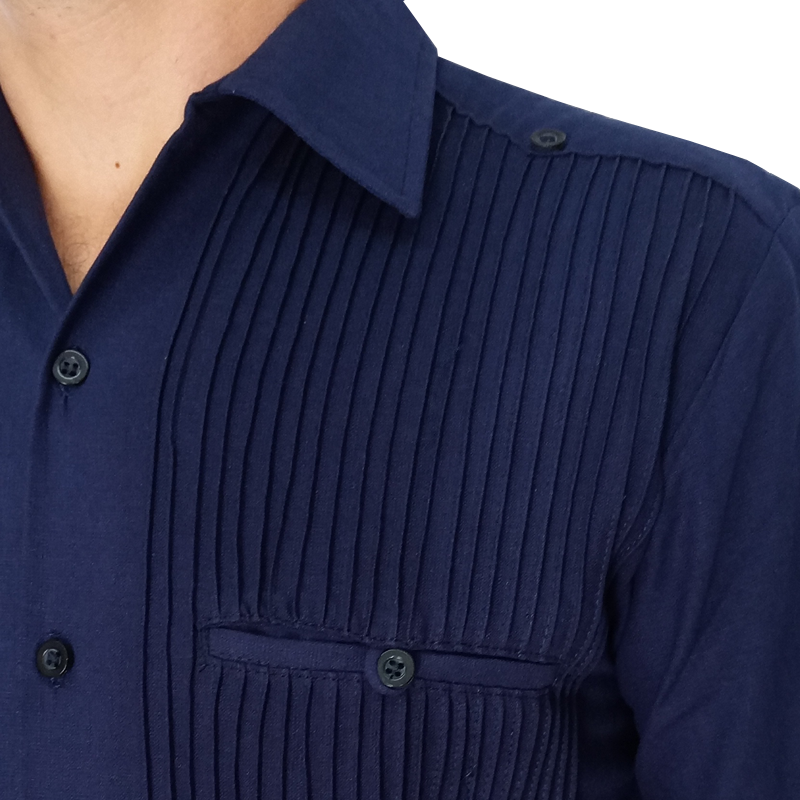 Close-up of navy blue guayabera pleats and button details