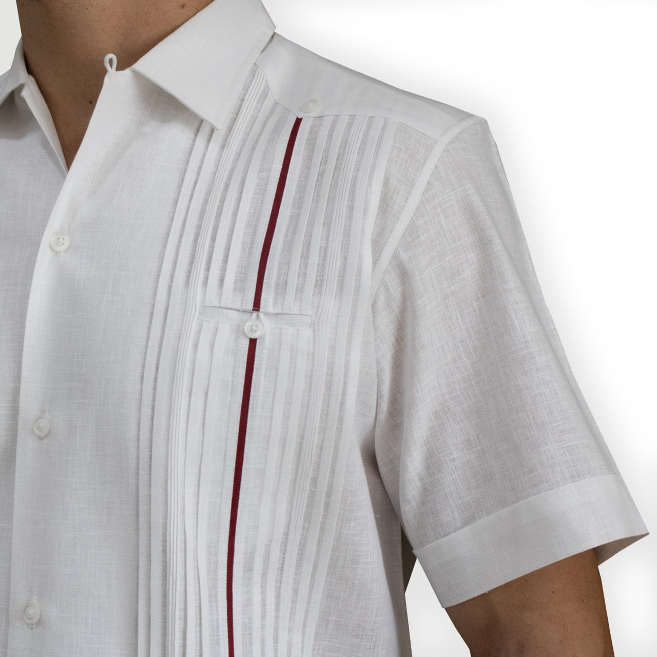 Close-up of red trim detail on luxury short-sleeve guayabera