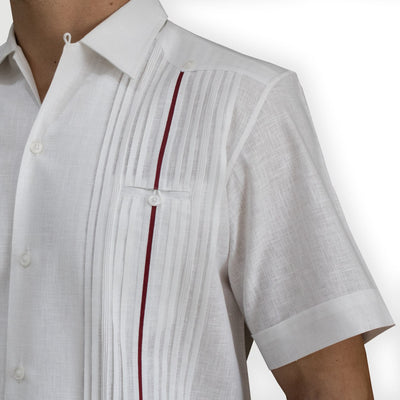 Close-up of red trim detail on luxury short-sleeve guayabera