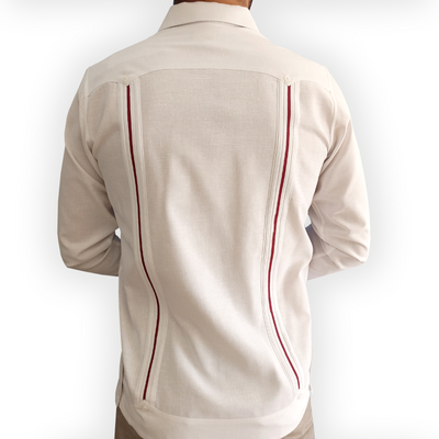 Close-up of red trim details on white long-sleeve guayabera