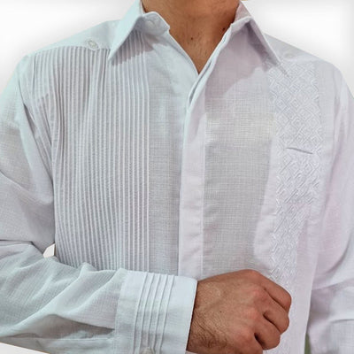 Close-up of white embroidery and pleated front on wedding guayabera – Casa Habana craftsmanship