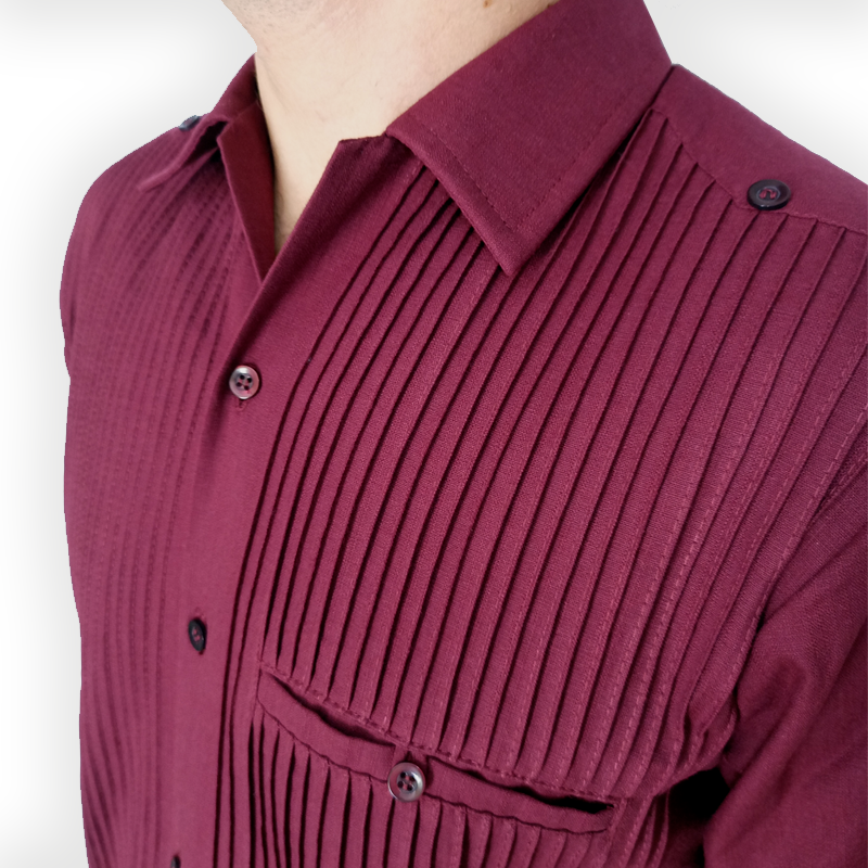 Close-up of wine red guayabera pleats and button details