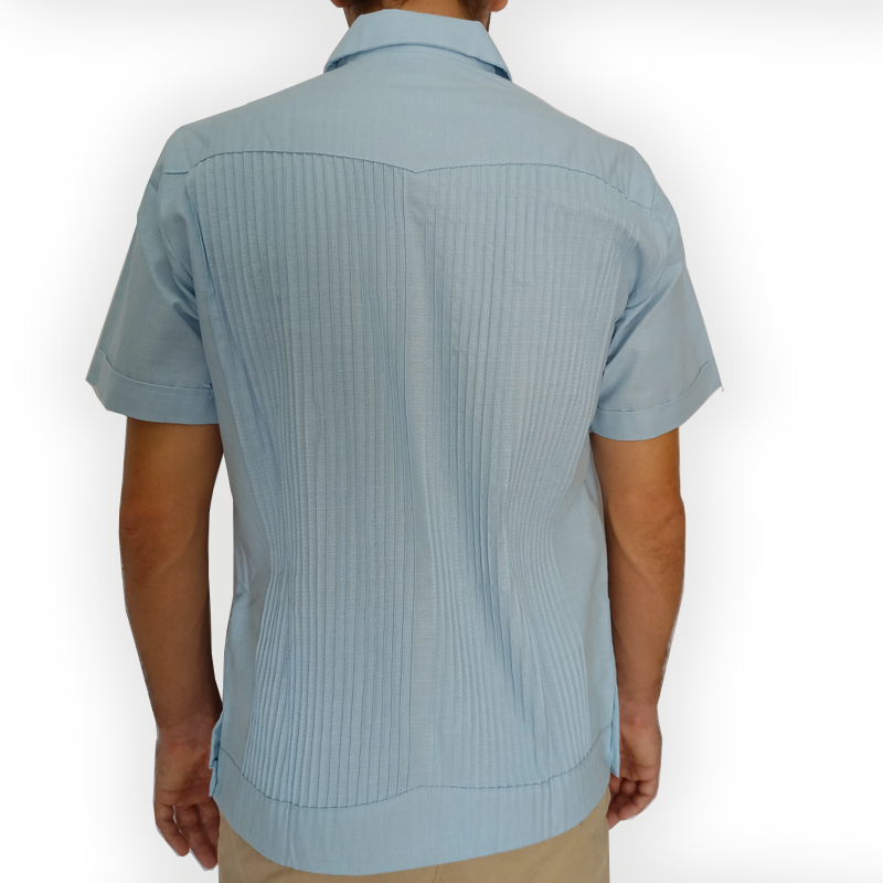 Light blue short sleeve guayabera shirt styled for summer events