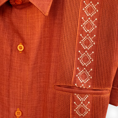 Man wearing burnt orange guayabera – Cuban-inspired summer style