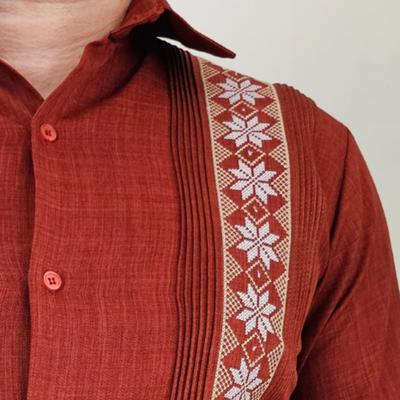 Man wearing burnt orange long sleeve guayabera