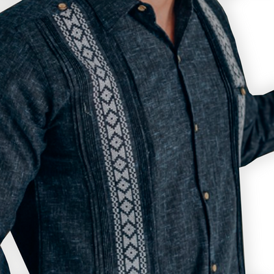 Man wearing dark blue embroidered long sleeve guayabera