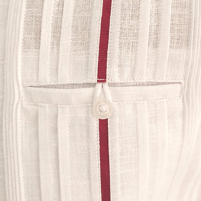 Man wearing elegant white long-sleeve guayabera with red trim – Casa Habana Collection