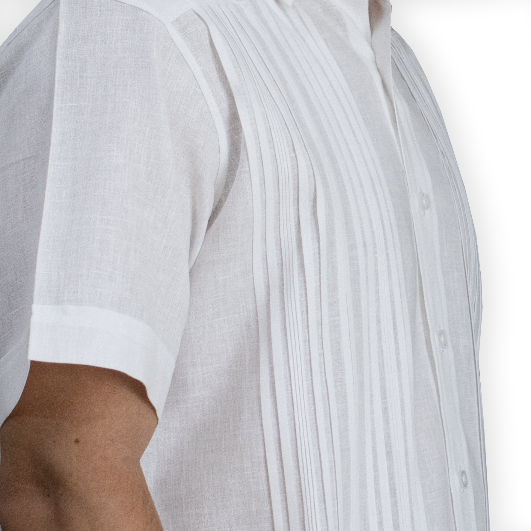Man wearing elegant white short-sleeve guayabera – Casa Habana Collection