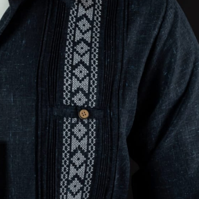Man wearing navy embroidered long sleeve guayabera