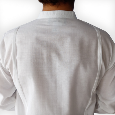 Man wearing traditional white guayabera with mandarin collar