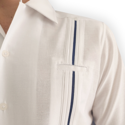 Man wearing white wedding guayabera with blue trim