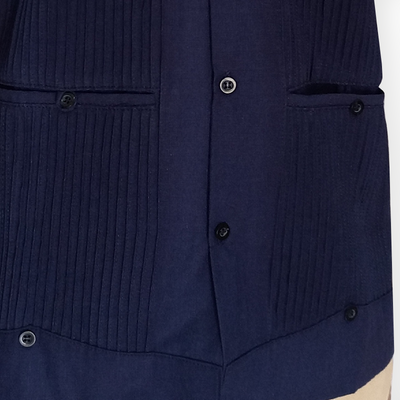 Navy blue short sleeve guayabera shirt styled for summer events
