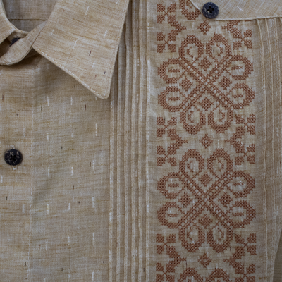 close-up of Agra fabric beige guayabera embroidery