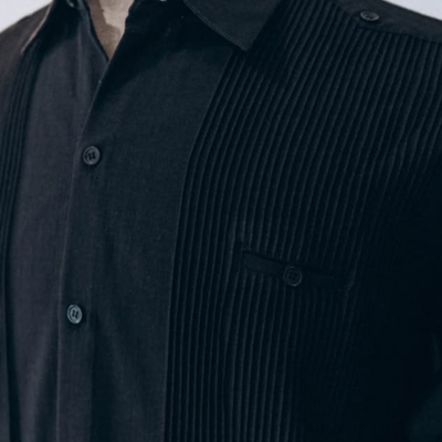 close-up of black presidential guayabera fabric