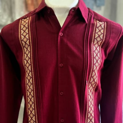 close-up of burgundy guayabera fabric texture