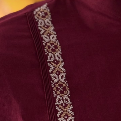 close-up of burgundy linen cotton guayabera fabric