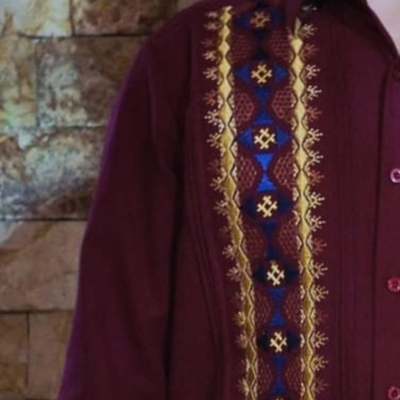close-up of dark red guayabera fabric texture