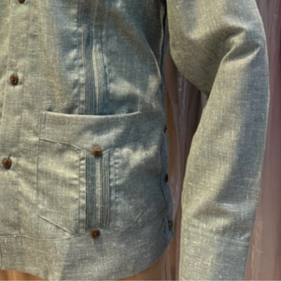 close-up of green linen cotton guayabera fabric
