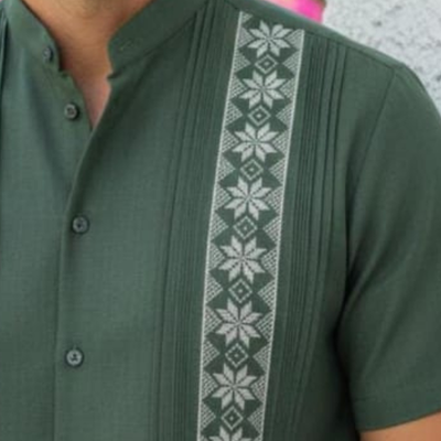 close-up of hunter green linen guayabera fabric