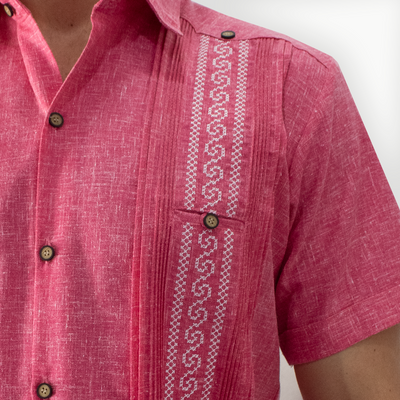 close-up of pink guayabera hand embroidery details