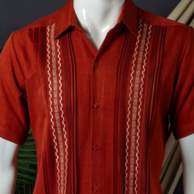 close-up of red embroidered guayabera detail