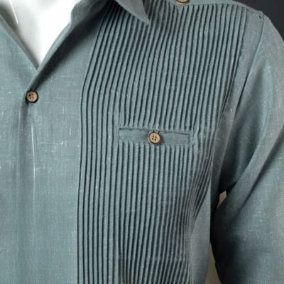 close-up of sage green presidential guayabera fabric