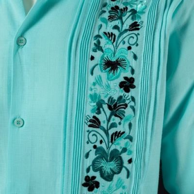 close-up of sea green linen cotton guayabera fabric