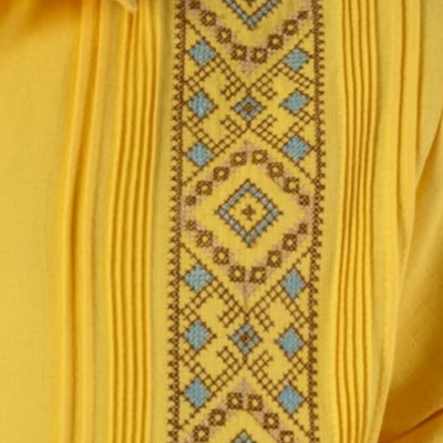 close-up of yellow guayabera fabric texture