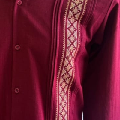 detail of burgundy guayabera stitching