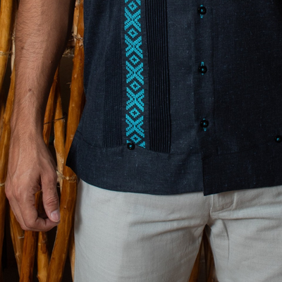 front view of dark blue embroidered guayabera shirt