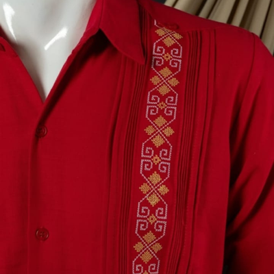 hand embroidery detail on red guayabera
