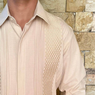 man wearing beige long sleeve guayabera