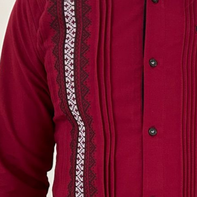 man wearing burgundy embroidered guayabera shirt