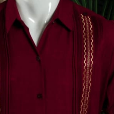 man wearing burgundy short sleeve guayabera
