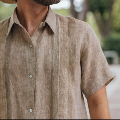 man wearing classic beige guayabera shirt