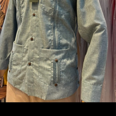 man wearing cuban green guayabera shirt