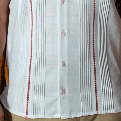 man wearing embroidered mandarin collar guayabera