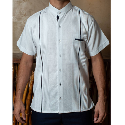 man wearing embroidered mandarin collar guayabera shirt