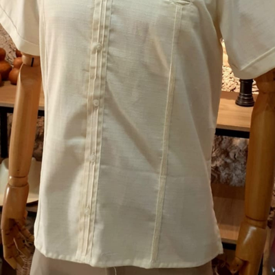 man wearing ivory mandarin collar guayabera