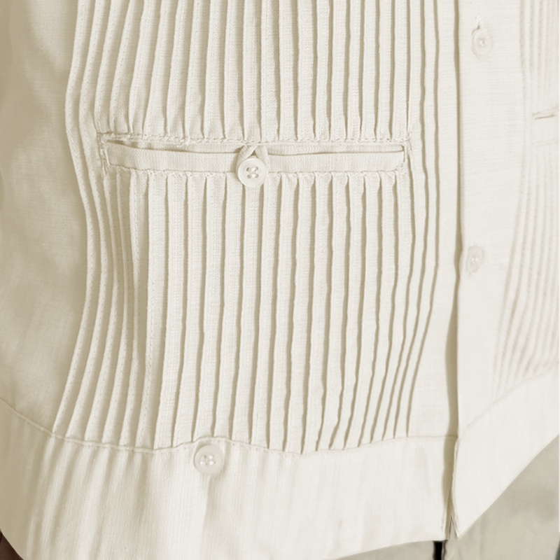 man wearing ivory short sleeve guayabera shirt