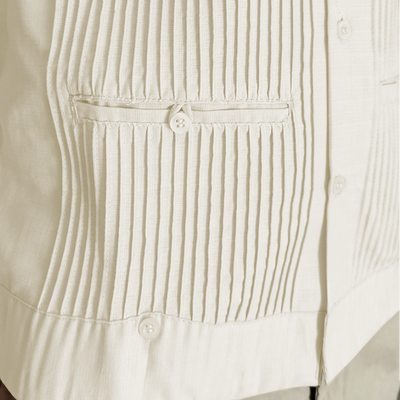 man wearing ivory short sleeve guayabera shirt