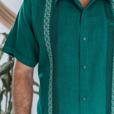 man wearing jade green short sleeve guayabera