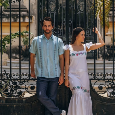 man wearing light blue guayabera shirt